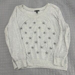 Gray sweater with sewn diamond embellishment detailing